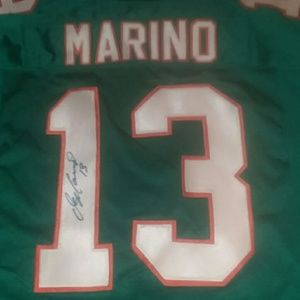 Autographed Dam Marino Dolphins football jersey